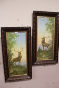A PAIR OF OAK FRAMED AND GLAZED WATERCOLOURS OF STAGS - OVERALL SIZE 83CM X 42.5CM