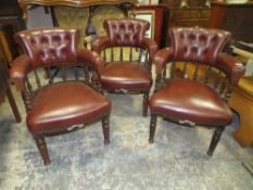 A SET OF THREE EARLY 20TH CENTURY OAK TUB ARMCHAIRS WITH UNUSUAL PLATED NAME PLAQUES TO THE FRONT