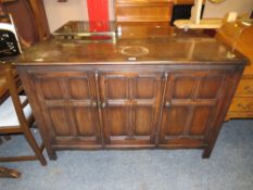 A DARK OAK PRIORY STYLE SIDEBOARD A/F