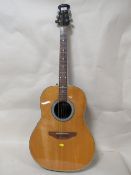 AN APPLAUSE ACOUSTIC GUITAR