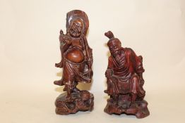 TWO CARVED WOODEN CHINESE FIGURES