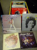 A SMALL TRAY OF RECORDS TO INCLUDE CLIFF RICHARD, FRANKIE LANE, GENE VINCENT ETC.