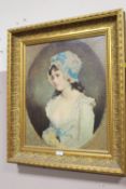 A GILT FRAMED PRINT ON CANVAS PORTRAIT OF A YOUNG LADY IN A BLUE AND WHITE BONNET TOGETHER WITH A G