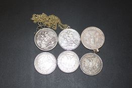 A BAG OF SILVER CROWNS AND AMERICAN COINS, SOME IN MOUNTS