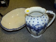A VINTAGE BLUE AND WHITE JUG AND BOWL SET