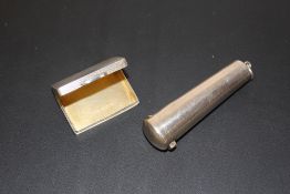 A HALLMARKED SILVER PILL BOX AND A HALLMARKED SILVER CHEROOT HOLDER