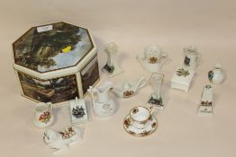 A TIN OF CRESTED WARE