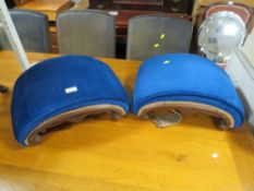 TWO CURVED MAHOGANY UPHOLSTERED FOOT STOOLS