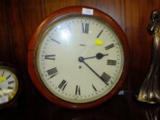 A LARGE CIRCULAR WALL CLOCK