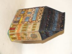 A VINTAGE MATERIAL FOLK ART HOUSE