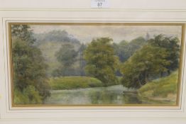A FRAMED AND GLAZED WATERCOLOUR OF A COUNTRY RIVER LANDSCAPE INSCRIBED M W MINSHALL VERSO, H 19 CM