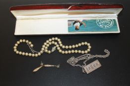 A HALLMARKED SILVER INGOT ON CHAIN, together with a pair of earrings and a faux pearl necklace (3)