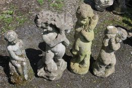 FOUR STONE GARDEN CHILDREN FIGURES