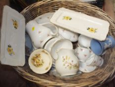 A TWIN HANDLED LOG BASKET OF CHINA AND CERAMICS TO INCLUDE DENBRO, WEDGWOOD JASPERWARE ETC