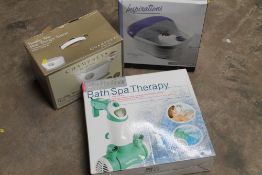 A FOOT SPA. WAS HEAT THERAPY SYSTEM AND BOXED BATH SPA THERAPY