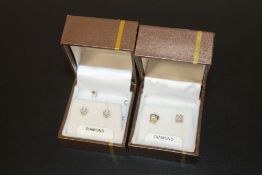 TWO PAIRS OF DIAMOND CLUSTER STUD EARRINGS