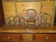 A CANDLE STAND TOGETHER WITH TWO WINE RACKS AND A SMALL CHILDS CHAIR