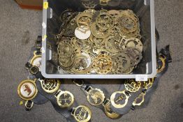 A BOX OF HORSE BRASSES