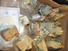A COLLECTION OF LILLIPUT LANE COTTAGE FIGURES