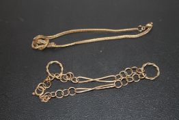 A HALLMARKED 9 CARAT GOLD BRACELET, TOGETHER WITH ANOTHER STAMPED 9K