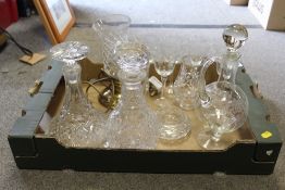 A TRAY OF CUT GLASS TO INCLUDE AN EDWARDIAN STYLE SIX PERSON DRINK SET, DECANTERS ETC.