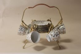 A RETRO CZECHOSLOVAKIAN SIX PERSON CUP AND SAUCER SET ON STAND