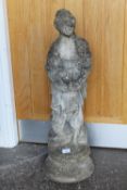 A STONE GARDEN FIGURE OF A FEMALE HOLDING A BIRD, H 82 CM