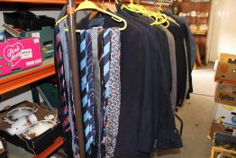 A LARGE QUANTITY OF GENTS CLOTHING TO INCLUDE SUITS, OVERCOAT, GOLF SHOES AND TIES