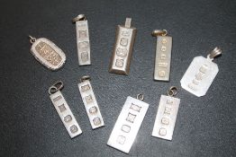 A SELECTION OF SILVER INGOT PENDANTS - APPROX 80.8 G