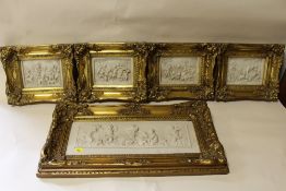 A SET OF FOUR 'PERFEGIUM REGIBUS' GILT FRAMED NEO CLASSICAL STYLE WALL PLAQUES TOGETHER WITH A