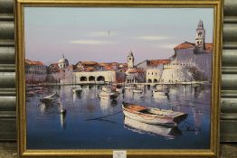 A GILT FRAMED OIL ON BOARD OF A CONTINENTAL HARBOUR SCENE WITH MOORED BOATS, SIGNED LOWER RIGHT, H