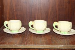 A SMALL BOX OF CARLTONWARE, CUPS AND SAUCERS