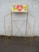 A 1950S RETRO STEEL FRAMED PET SHOP POINT OF SALE ADVERTISING DISPLAY STAND FOR RED HEART DOG /