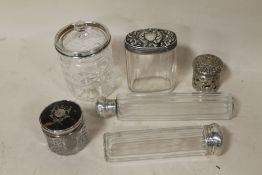 A COLLECTION OF SILVER TOPPED VANITY JARS ETC. TO INCLUDE A TORTOISESHELL LIDDED EXAMPLE AND A
