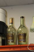 A PAIR OF LARGE 4.5 LITRE MARTELL VS COGNAC BOTTLES 47.5 CM