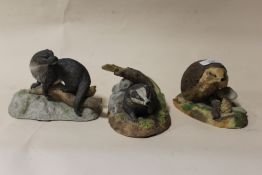 THREE MATT FINISH WEDGWOOD PORCELAIN ANIMAL FIGURES OF AN OTTER, BADGER AND A HEDGEHOG