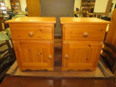 A PAIR OF PINE BEDSIDE CABINETS