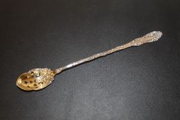 A LONG STERLING SILVER PIERCED SPOON LENGTH - 21CM