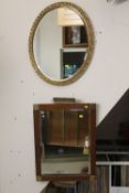 AN EDWARDIAN STYLE BEVEL EDGED DRESSING MIRROR COMPLETE WITH TWO BRUSHES TOGETHER WITH A GILT FRAMED
