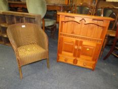 A SMALL CHILDS LLOYD LOOM ARMCHAIR AND A PINE RACK