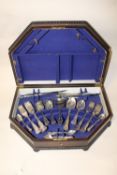 AN OAK CASED CANTEEN OF QUEENS PATTERN CUTLERY