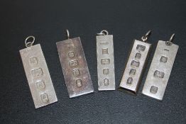 A SELECTION OF SILVER INGOT PENDANTS - APPROX 140.1