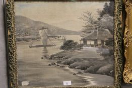 A FRAMED AND GLAZED EASTERN STYLE PICTURE ON CLOTH ON BOARD - OVERALL SIZE 49.5CM X 55CM