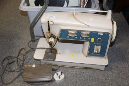 A SINGER 706 ELECTRIC SEWING MACHINE