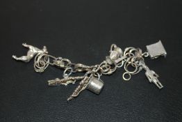 A SILVER CHARM PENDANT - APPROX 25G
