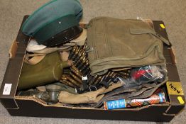 A BOX OF BRITISH AND GERMAN MILITARIA TO INCLUDE P37 WEBBING, MACHINE GUN BELT, CAP ETC