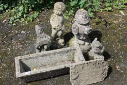 A SMALL RECTANGULAR PLANTER WITH FOUR SMALL GARDEN FIGURES ETC