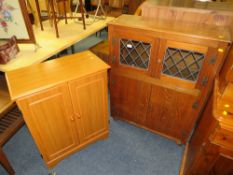 AN OAK LEADED BOOKCASE TOGETHER WITH ANOTHER MODERN CABINET (2)