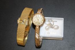 A 9 CARAT GOLD CASED AVIA WRIST WATCH, TOGETHER WITH A PAIR OF EARRINGS AND A ROYCE EXAMPLE