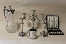 A SILVER PLATED CUT GLASS CLARET JUG TOGETHER WITH A PAIR OF CANDLE STICKS, CANDELABRA, CASED CAKE